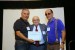 Dr. Nagib Callaos, General Chair, giving Eng. Carlos A. Meneses and Eng. Saulo Torres the best paper award certificate of the session "Sistemas / Tecnologías de la Información y Globalización Académica". The title of the awarded paper is "Ajedrez con Accesibilidad y Autonomía para Personas en Situación de Discapacidad Visual."